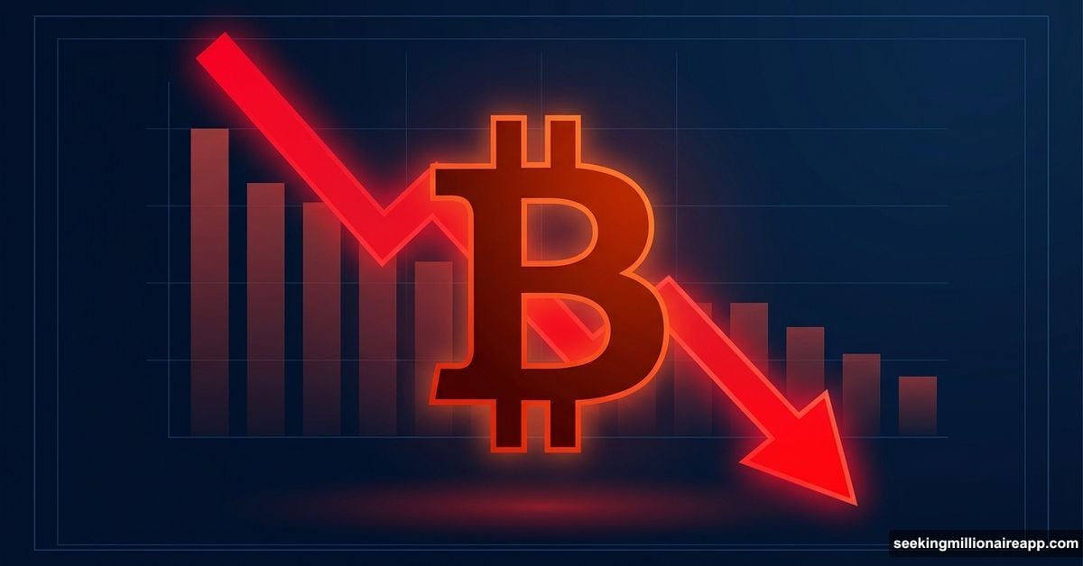 Bitcoin symbol with red downward arrow showing crypto market selling pressure